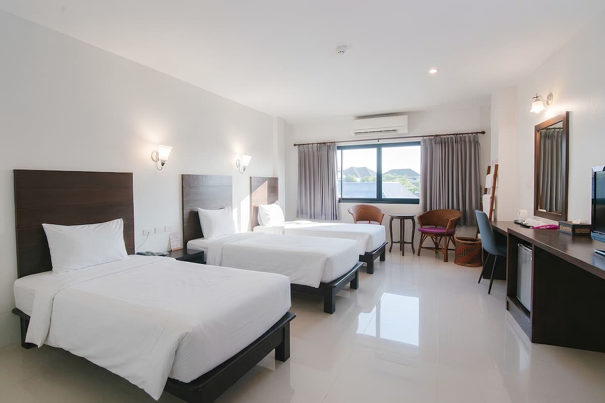 Cortinas blackout, wifi gratis y ropa de cama