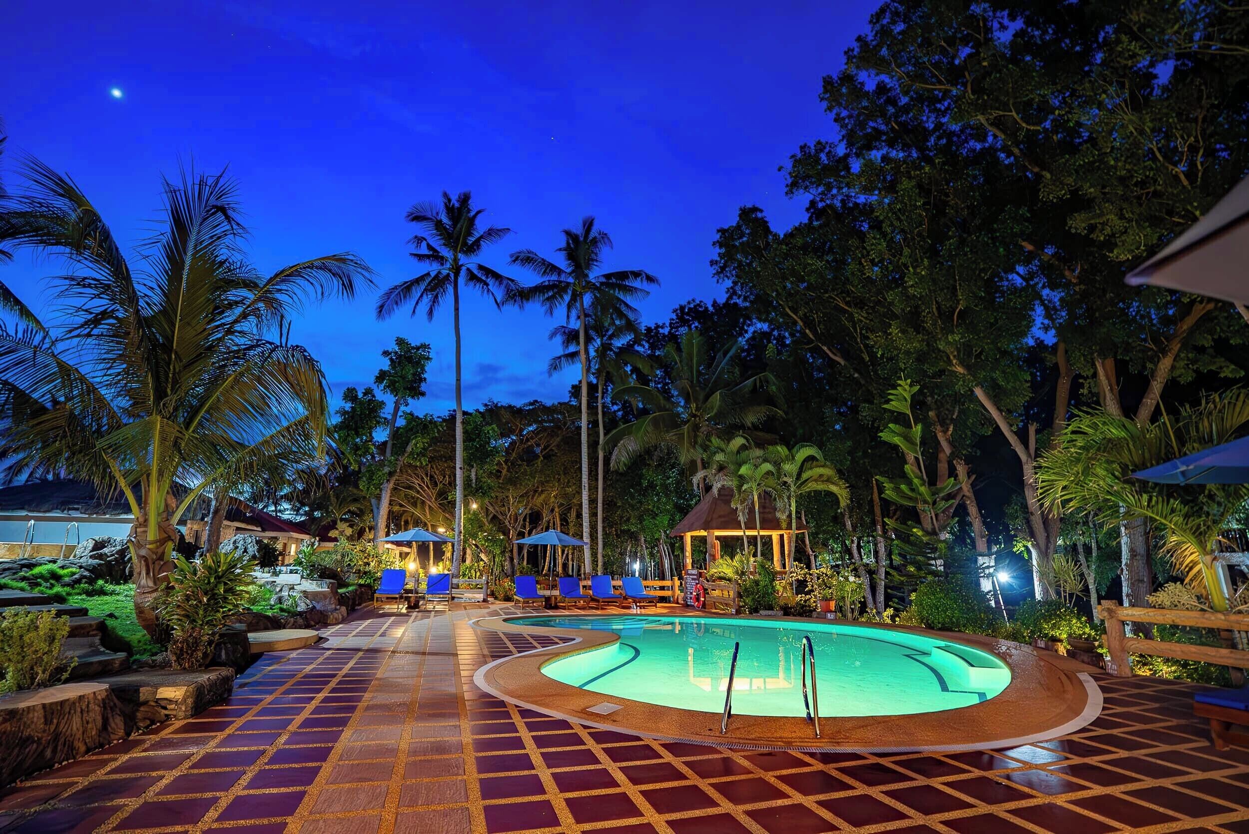 outdoor pool, pool umbrellas, pool loungers