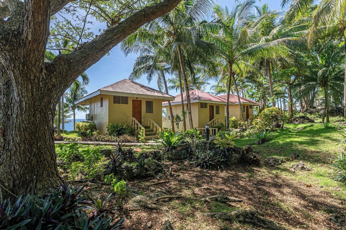 Ocean View Bungalow Standard with Air conditioning | Minibar, brankas, meja kerja, dan tempat tidur bayi gratis