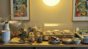 A breakfast buffet with various food items and condiments. - La Fraîchette (La Riviere-Saint-Sauveur)