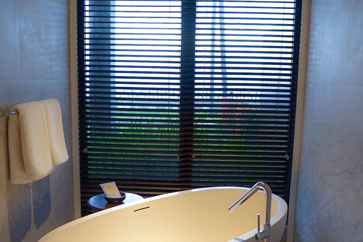 ocean suite | bathroom | shower, free toiletries, hair dryer, slippers