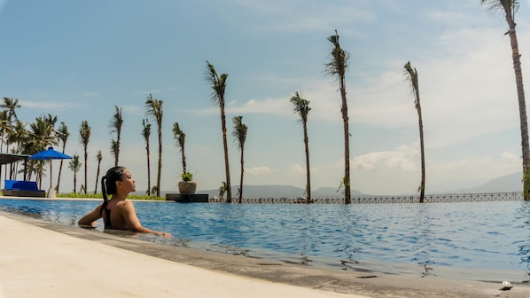 2 outdoor pools, open 8:00 AM to 8:00 PM, pool umbrellas, pool loungers