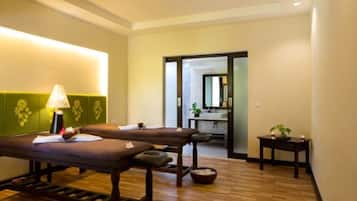 Experience serene tranquility in this traditional Japanese-inspired space, featuring a tatami mat floor and a low table with a cushion.