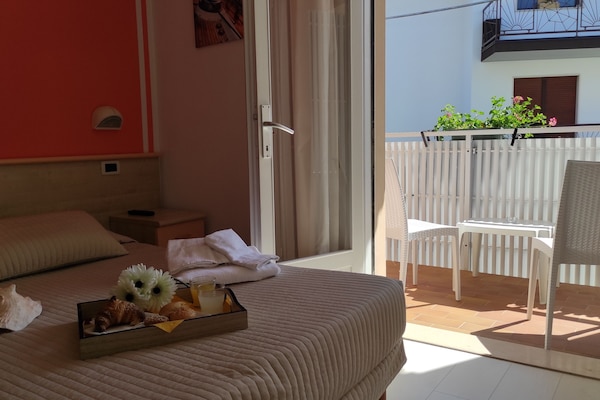 Double or Twin Room, Balcony | In-room safe, desk, free cribs/infant beds, free WiFi