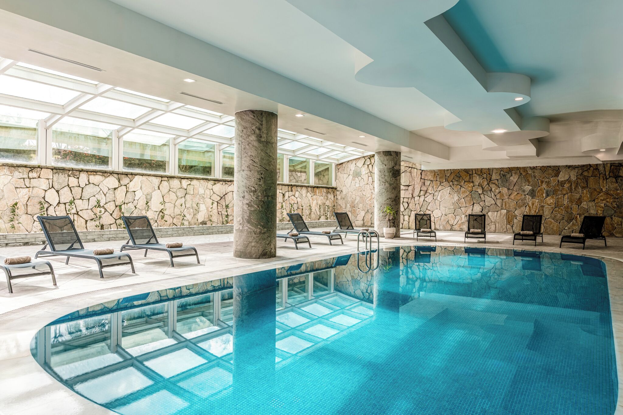 Indoor pool, seasonal outdoor pool, free pool cabanas, pool umbrellas
