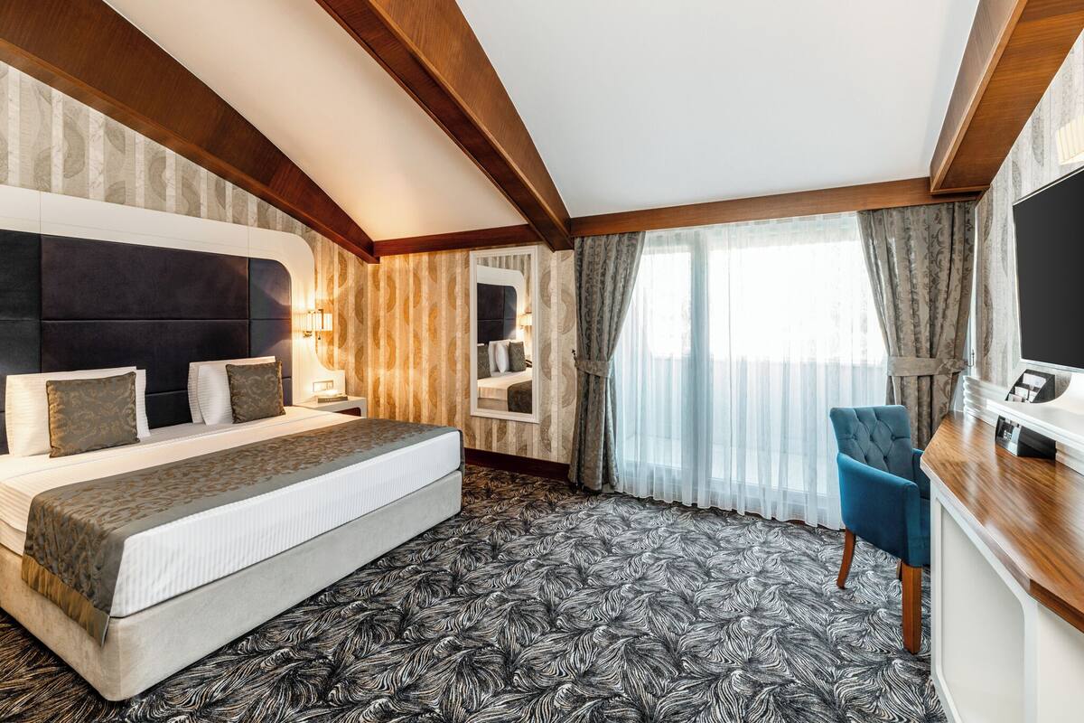 King Suite | Hochwertige Bettwaren, Minibar, Zimmersafe, Schreibtisch