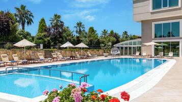 Indoor pool, seasonal outdoor pool, free pool cabanas, pool umbrellas