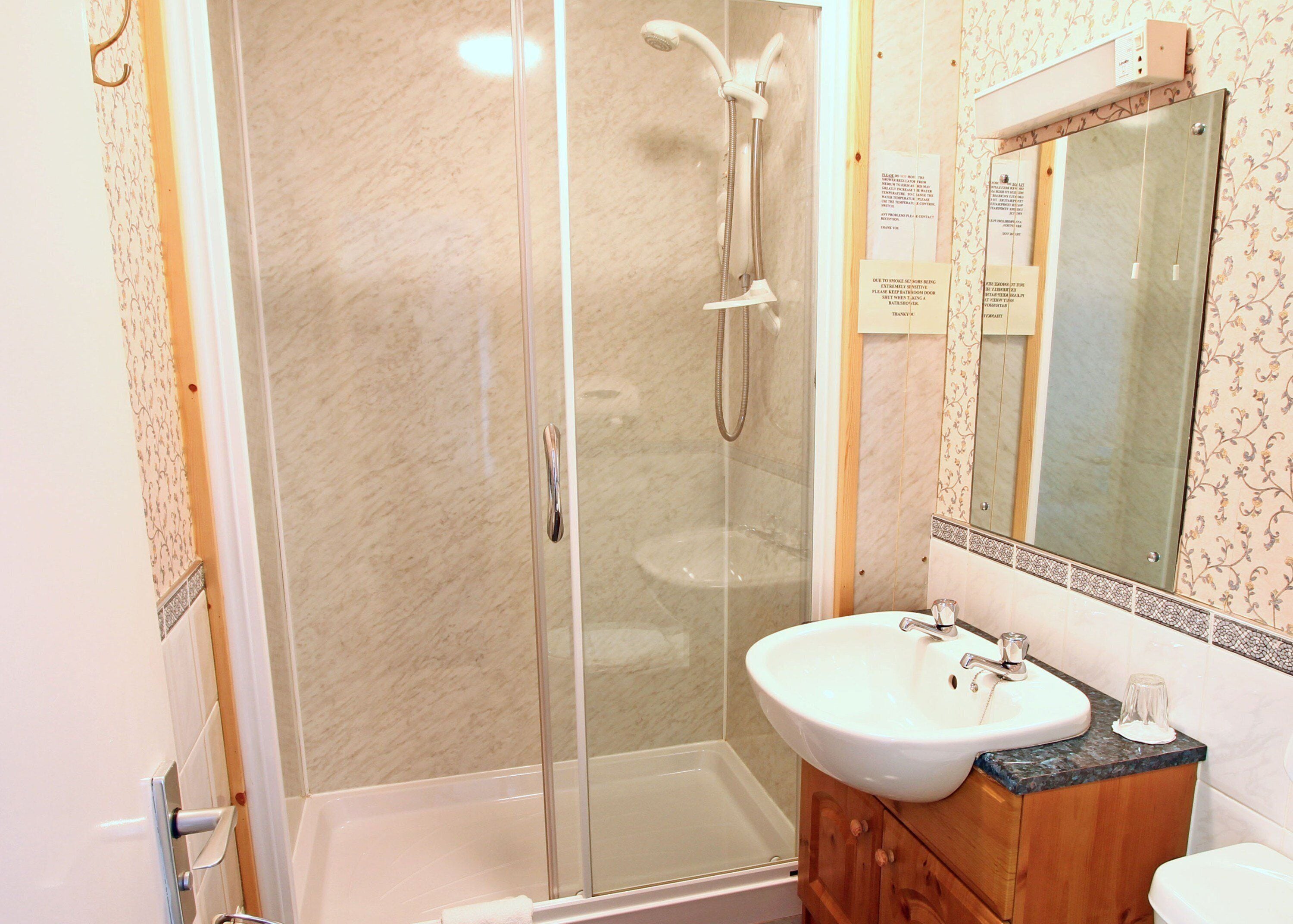 family room, 2 double beds, city view | bathroom | hair dryer, towels