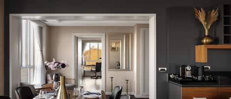 Executive Suite, 1 King Bed | Living area | 104-cm plasma TV with cable channels, TV