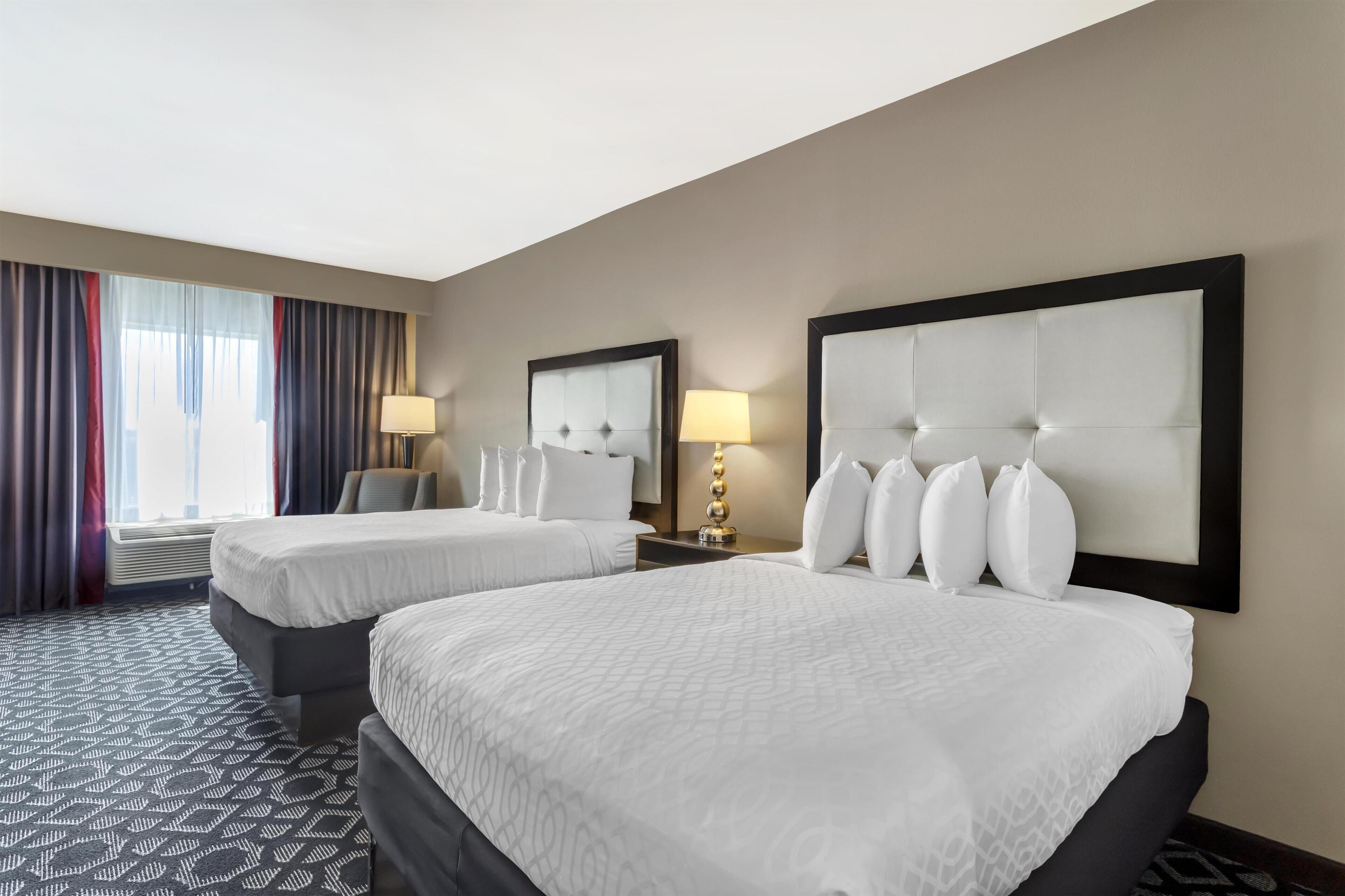 Habitación estándar, 2 camas de matrimonio, no fumadores | Ropa de cama de alta calidad, caja fuerte, escritorio