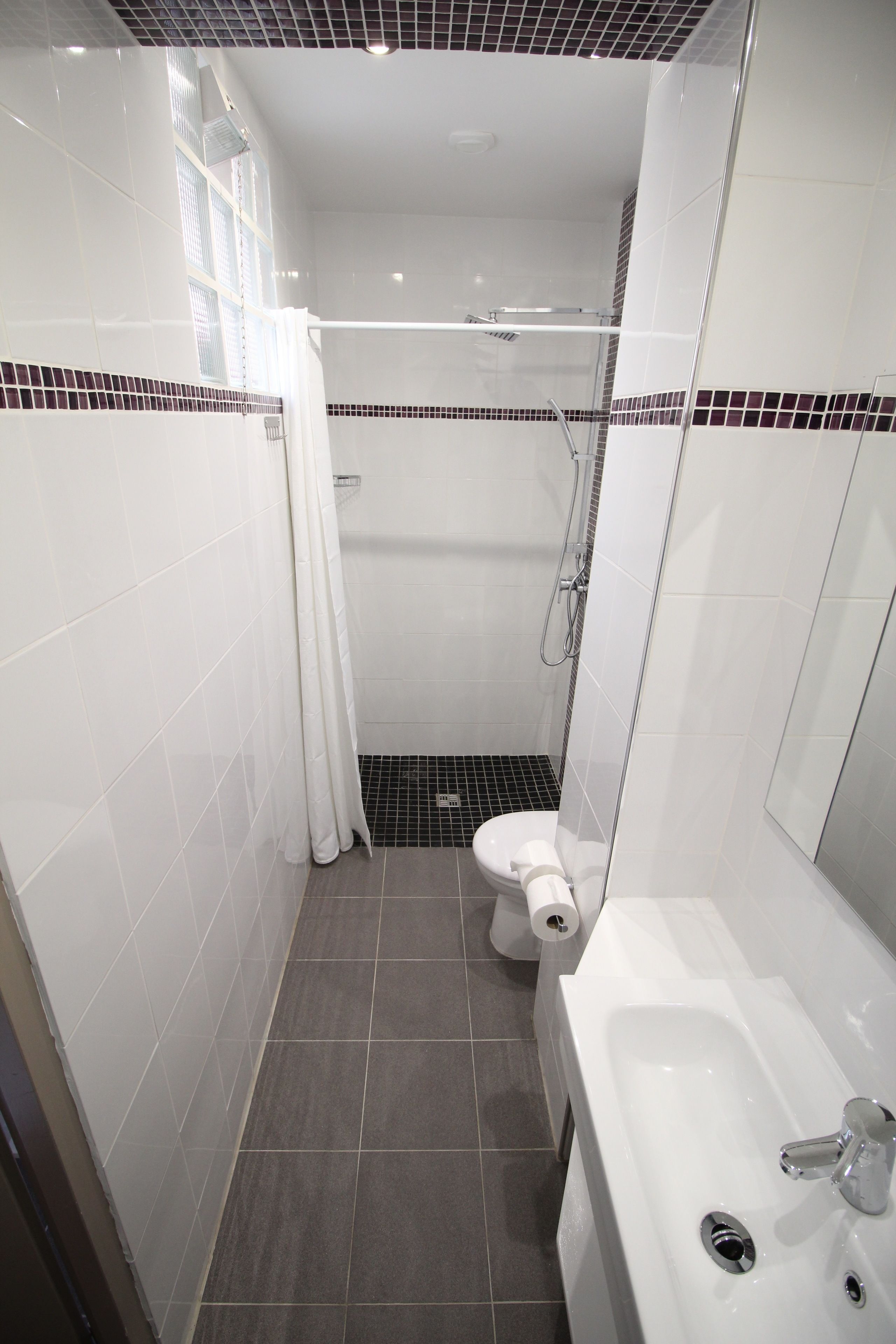 quadruple room | bathroom | shower, hair dryer, towels