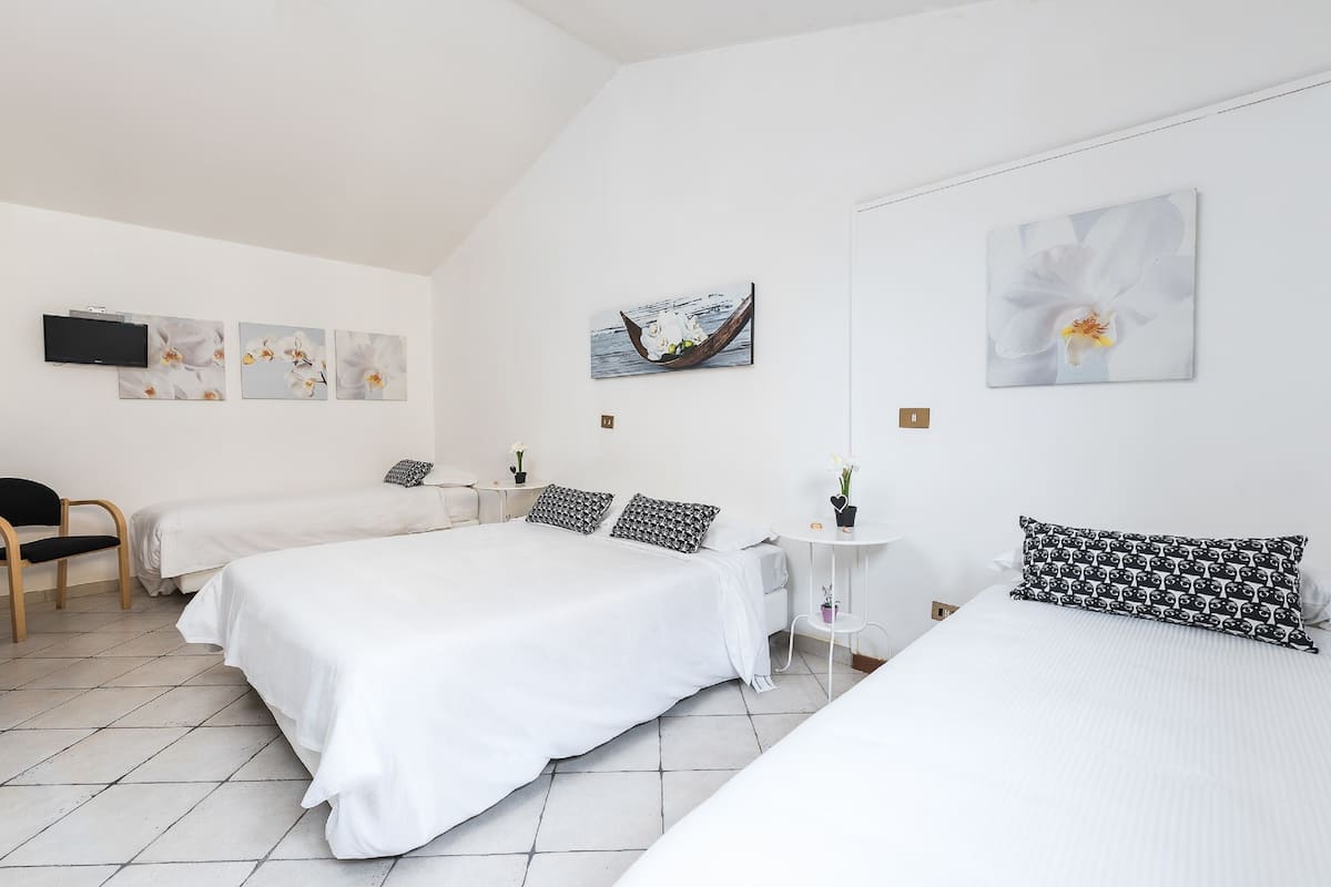 Classic Quadruple Room, Non Smoking | Premium bedding, down comforters, WiFi (free), bed sheets