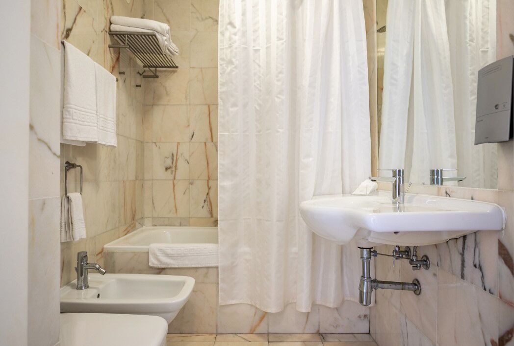 basic double or twin room, garden view | bathroom | hair dryer, bidet, towels
