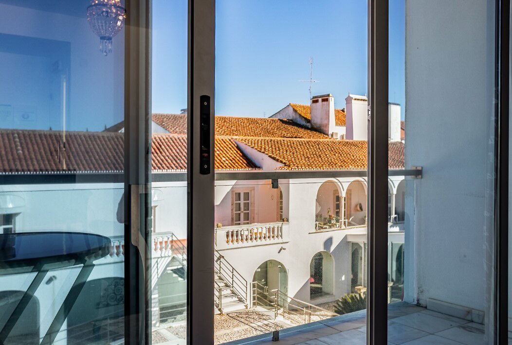 superior suite, 1 bedroom, balcony, pool view | desk, laptop workspace, blackout curtains, free wifi