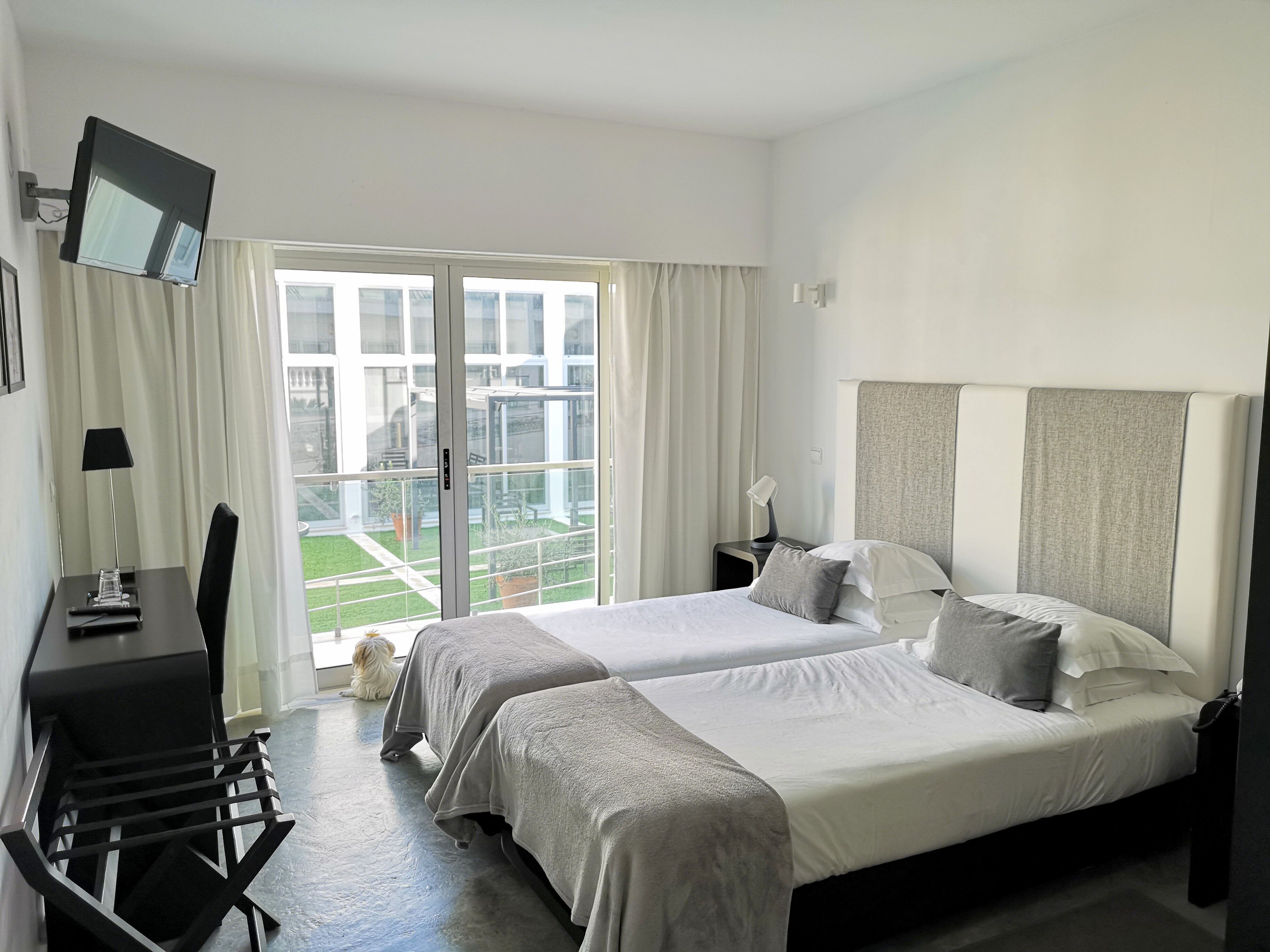 double room single use, garden view | desk, laptop workspace, blackout curtains, free wifi