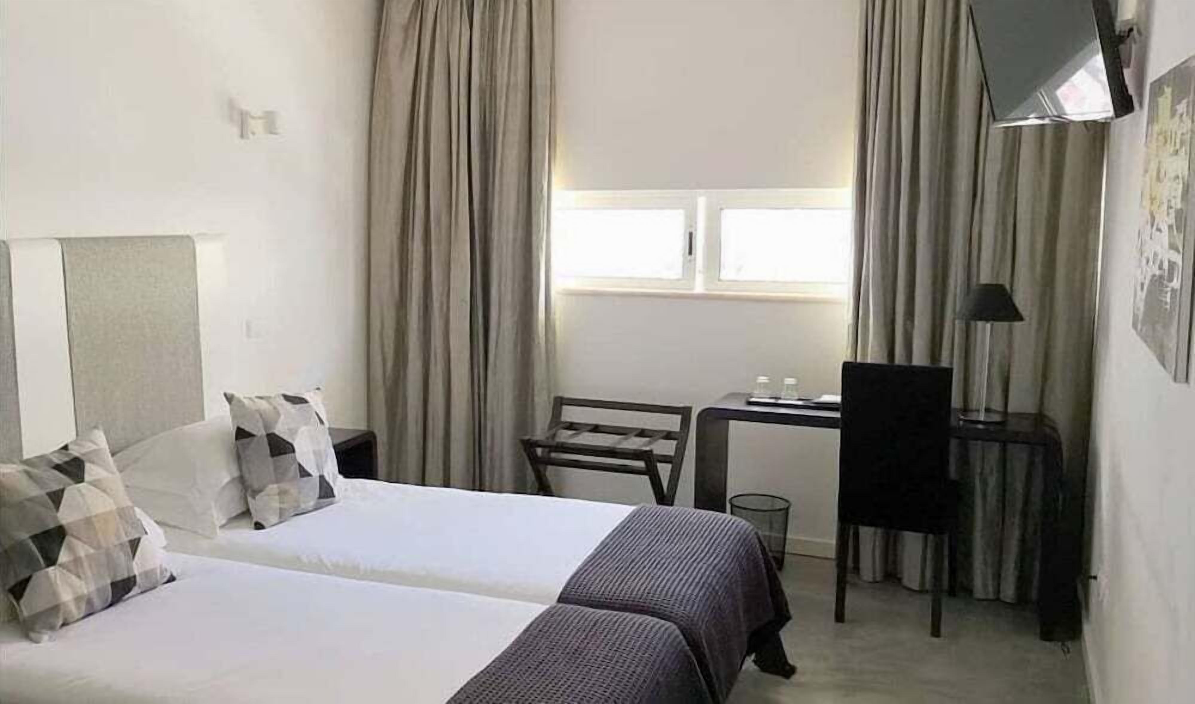 Desk, laptop workspace, blackout drapes, free WiFi