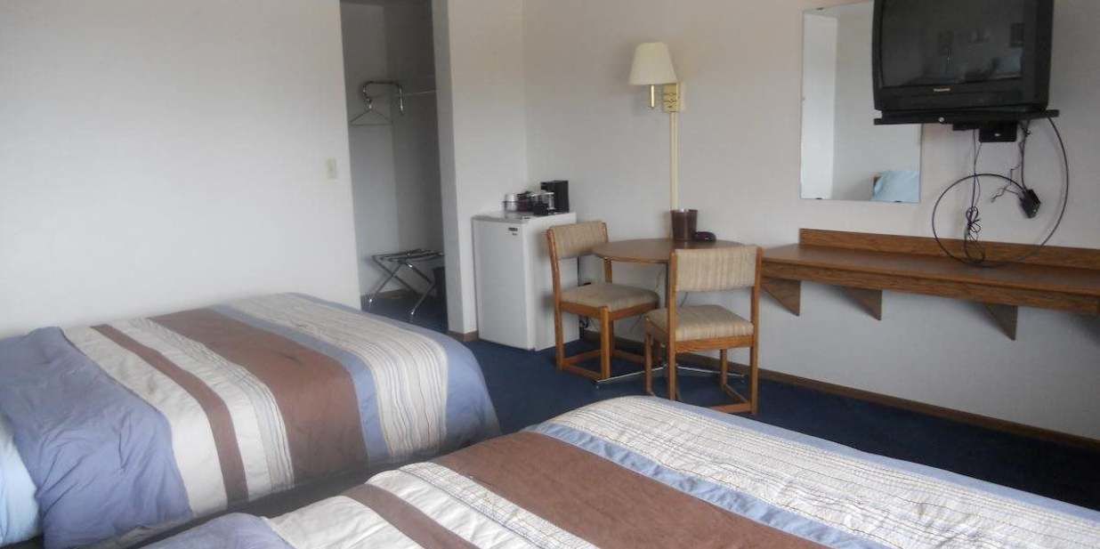 standard room, 2 queen beds | desk, blackout curtains, iron/ironing board, free wifi