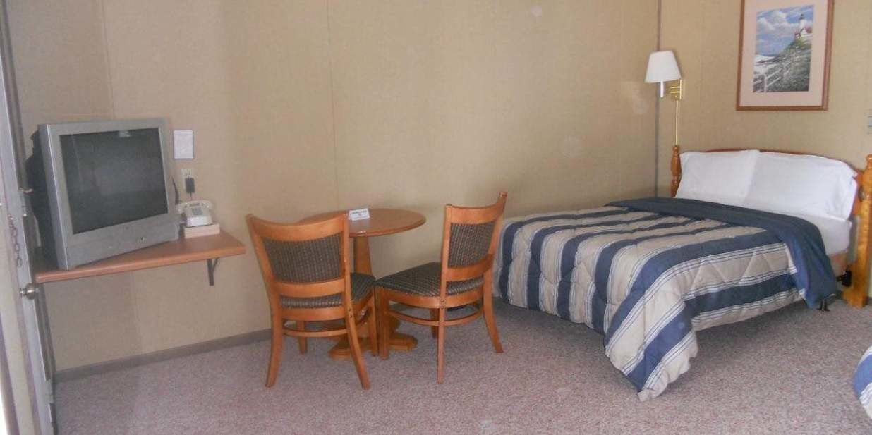 standard room, 2 double beds | desk, blackout curtains, iron/ironing board, free wifi