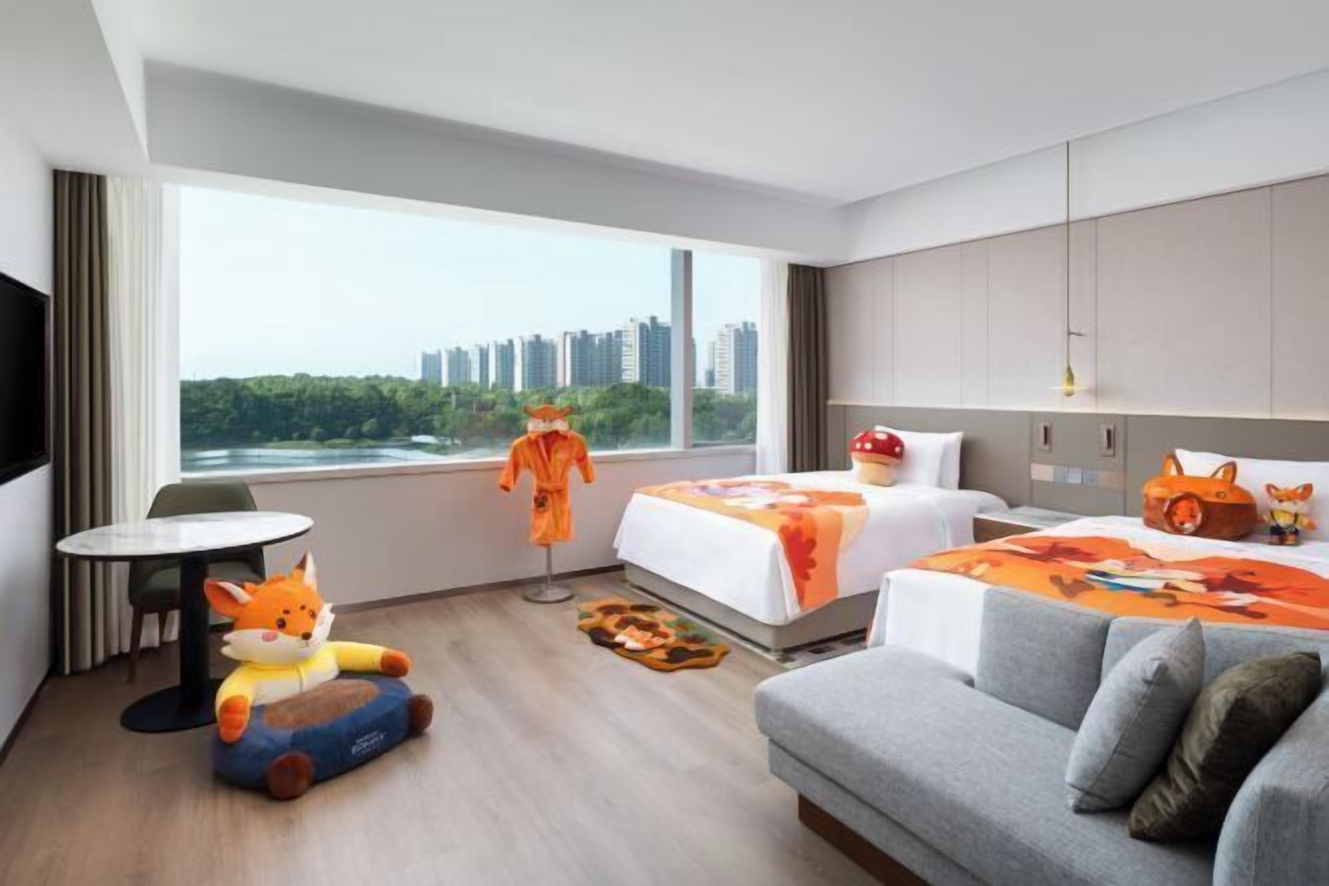 Premium bedding, down comforters, in-room safe, desk