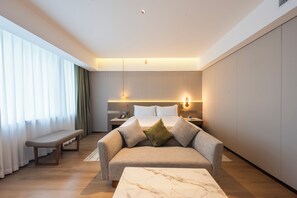 Premium bedding, down duvets, in-room safe, desk