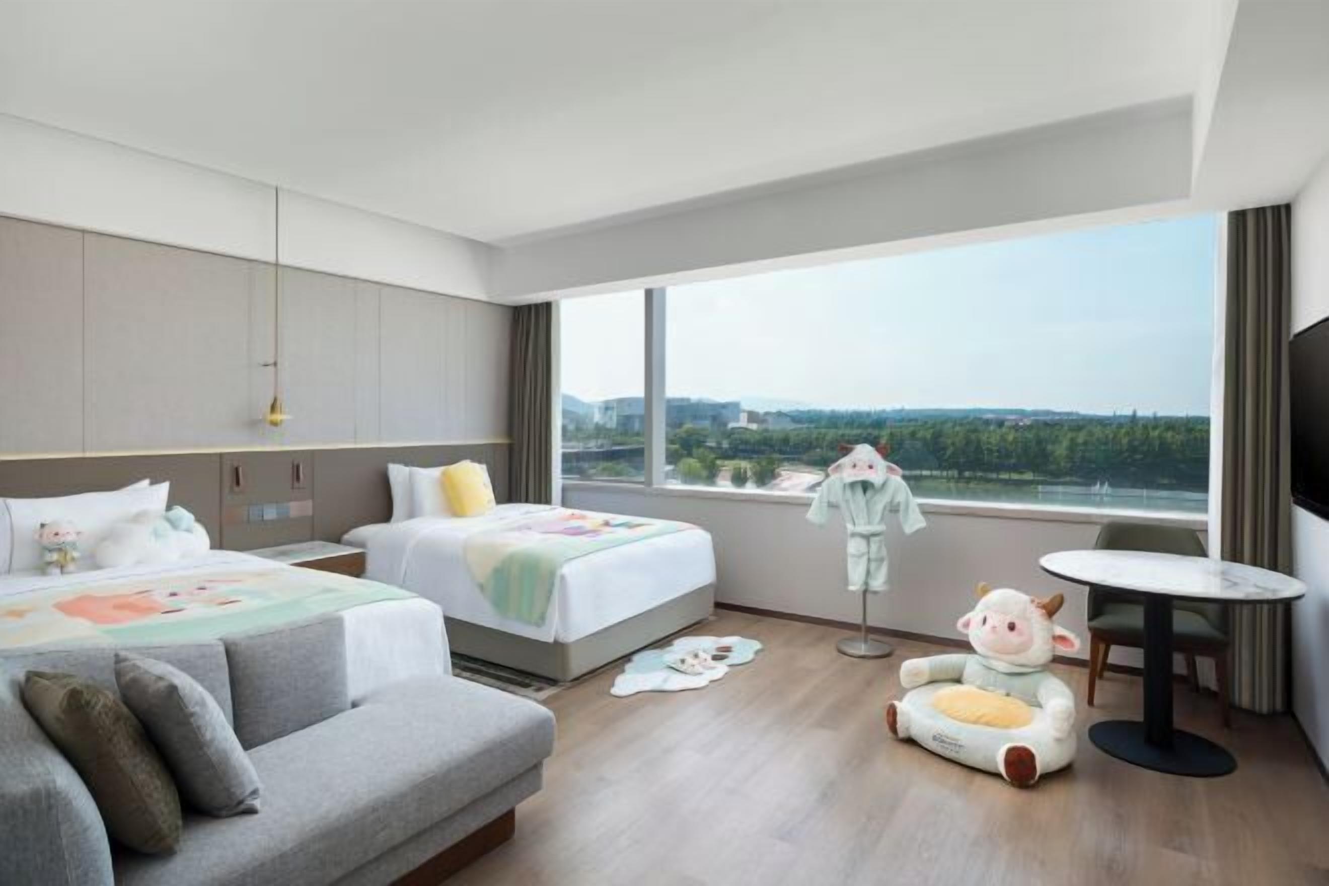 Premium bedding, down comforters, in-room safe, desk