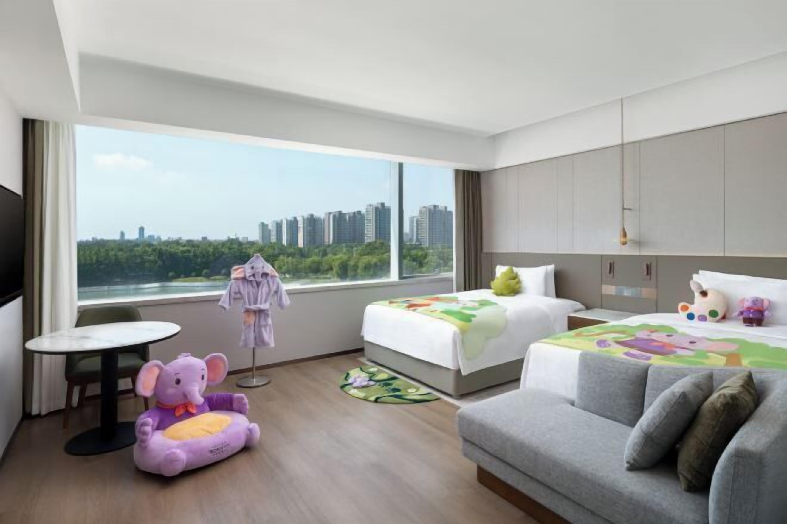 Premium bedding, down comforters, in-room safe, desk