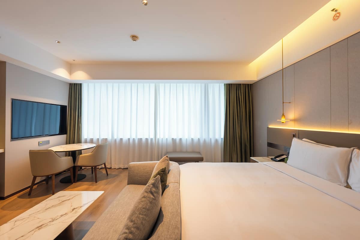 Habitación, 1 cama King size | Ropa de cama de alta calidad y edredón
