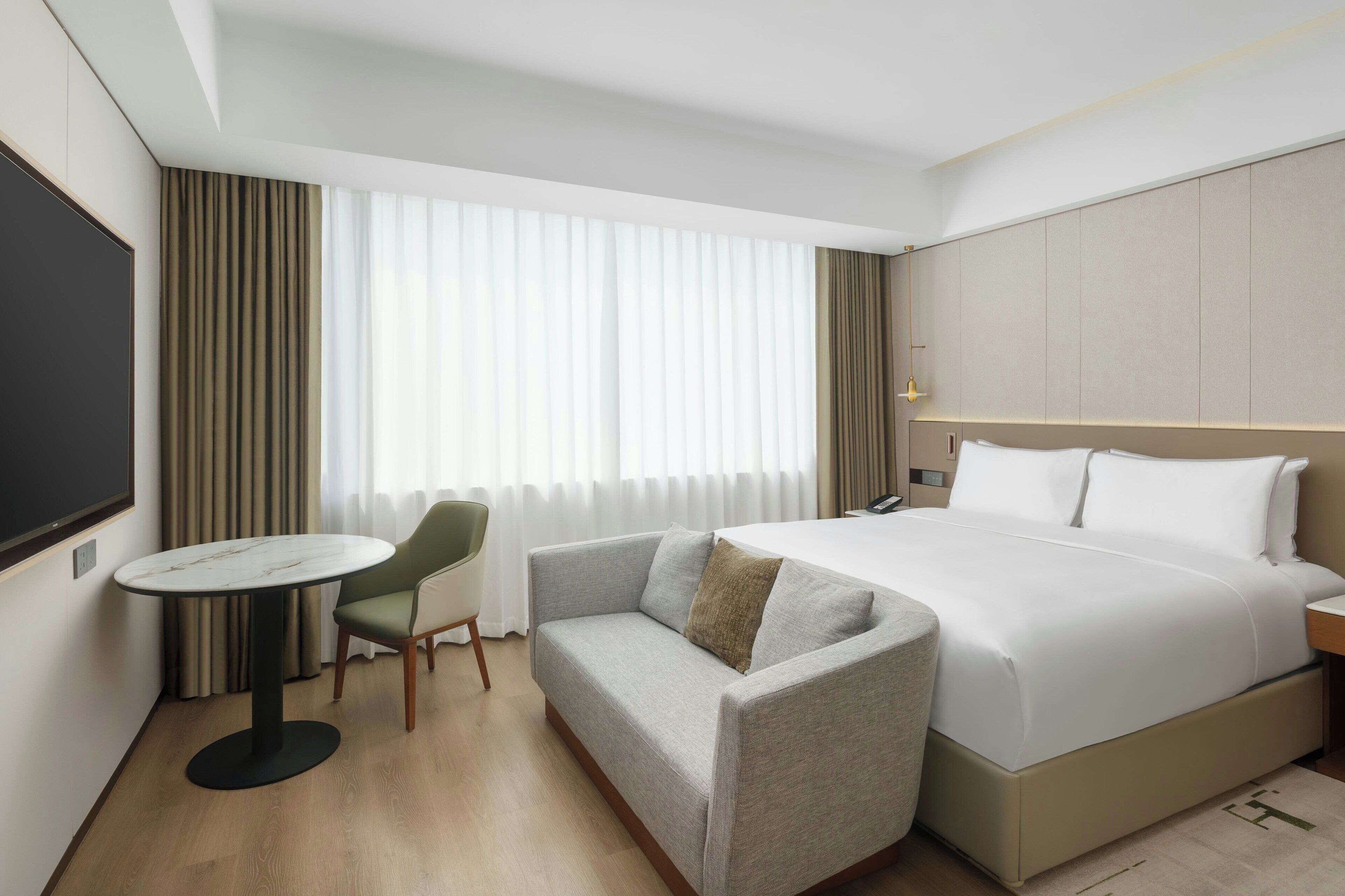 Room, 1 King Bed | Premium bedding, down comforters, in-room safe, desk