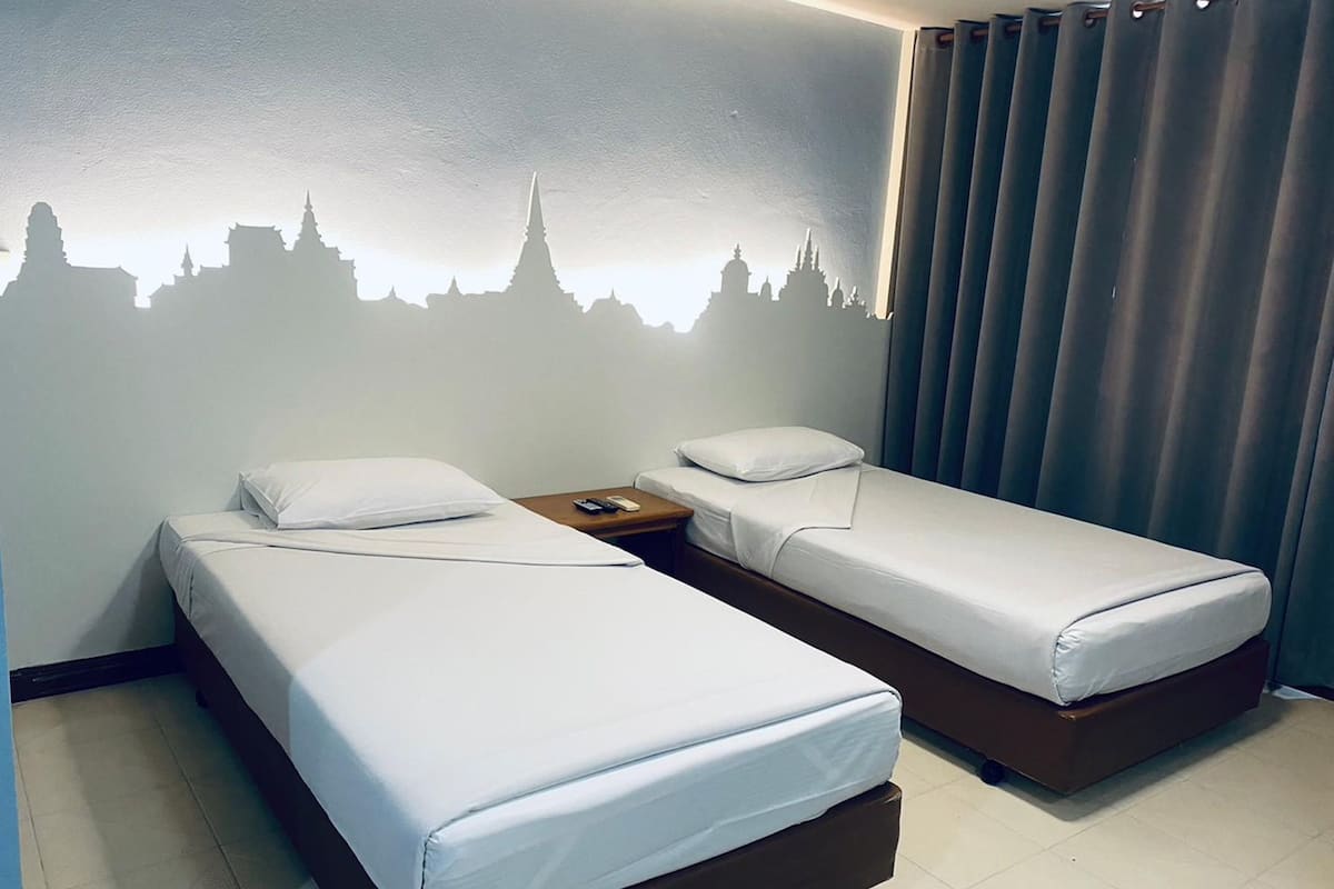Standaard kamer | Een bureau, verduisterende gordijnen, gratis wifi, beddengoed
