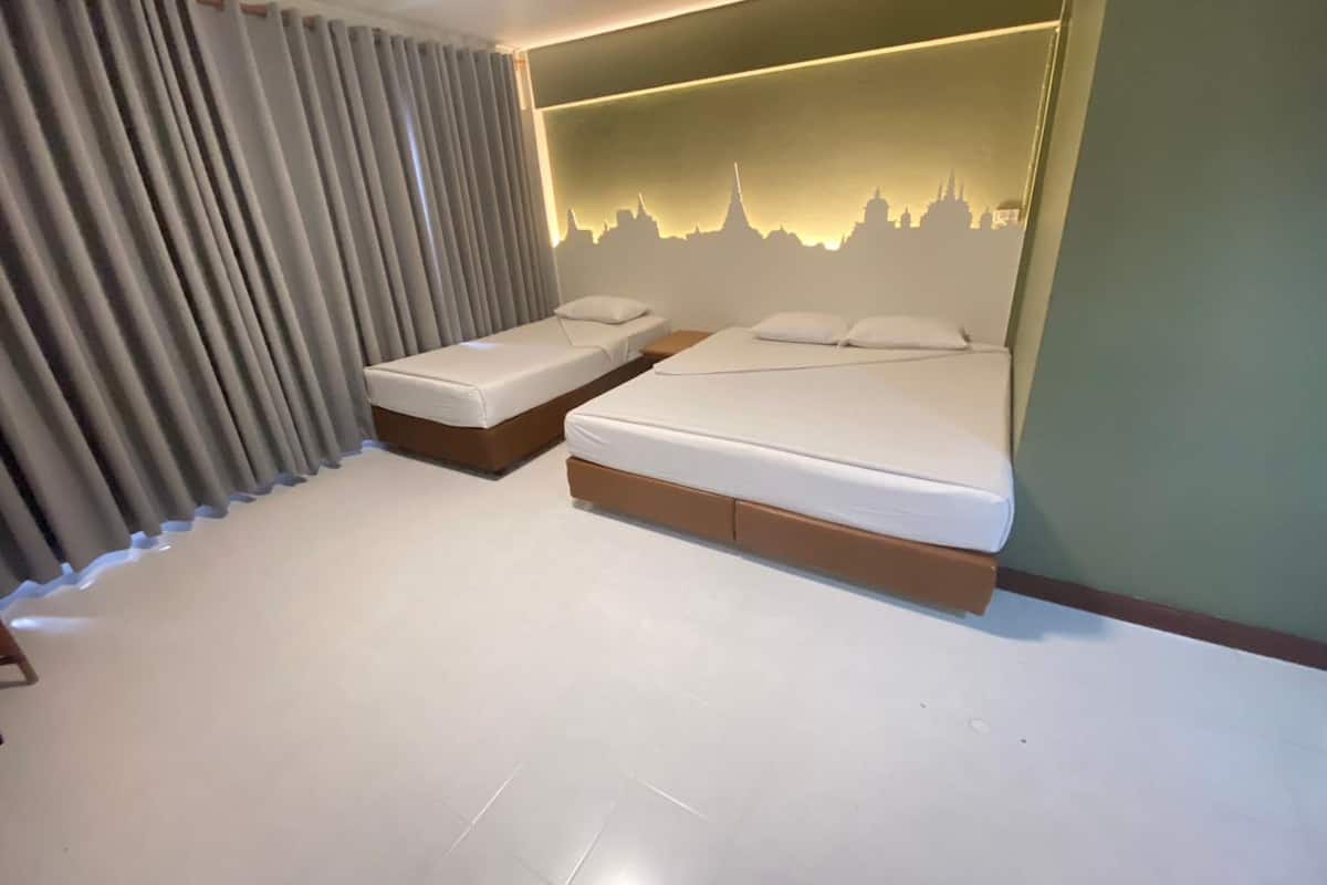 Familie suite | Een bureau, verduisterende gordijnen, gratis wifi, beddengoed