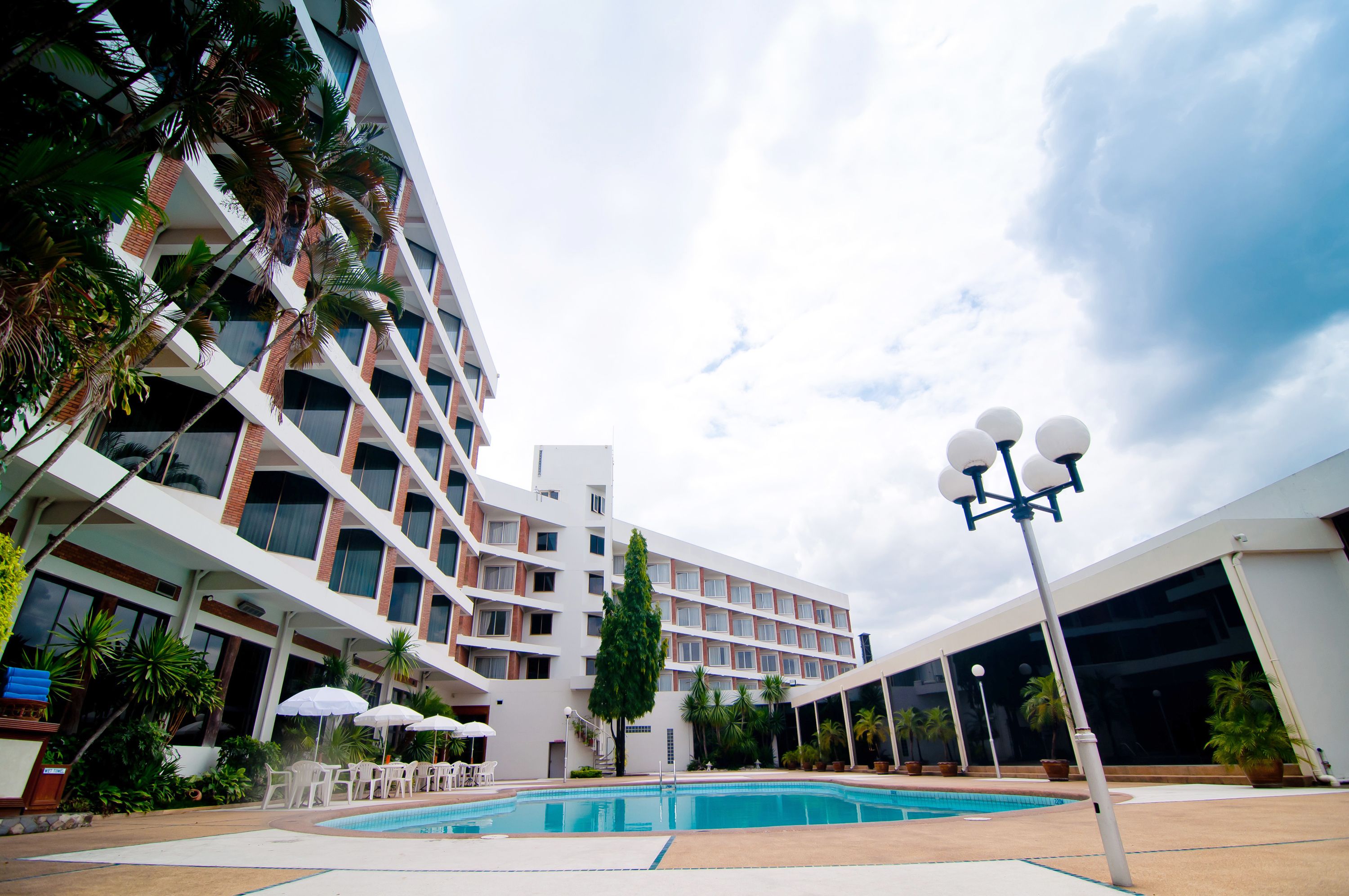 outdoor pool, pool umbrellas, pool loungers