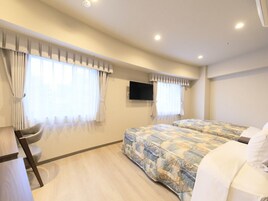 Premium bedding, desk, laptop workspace, free WiFi