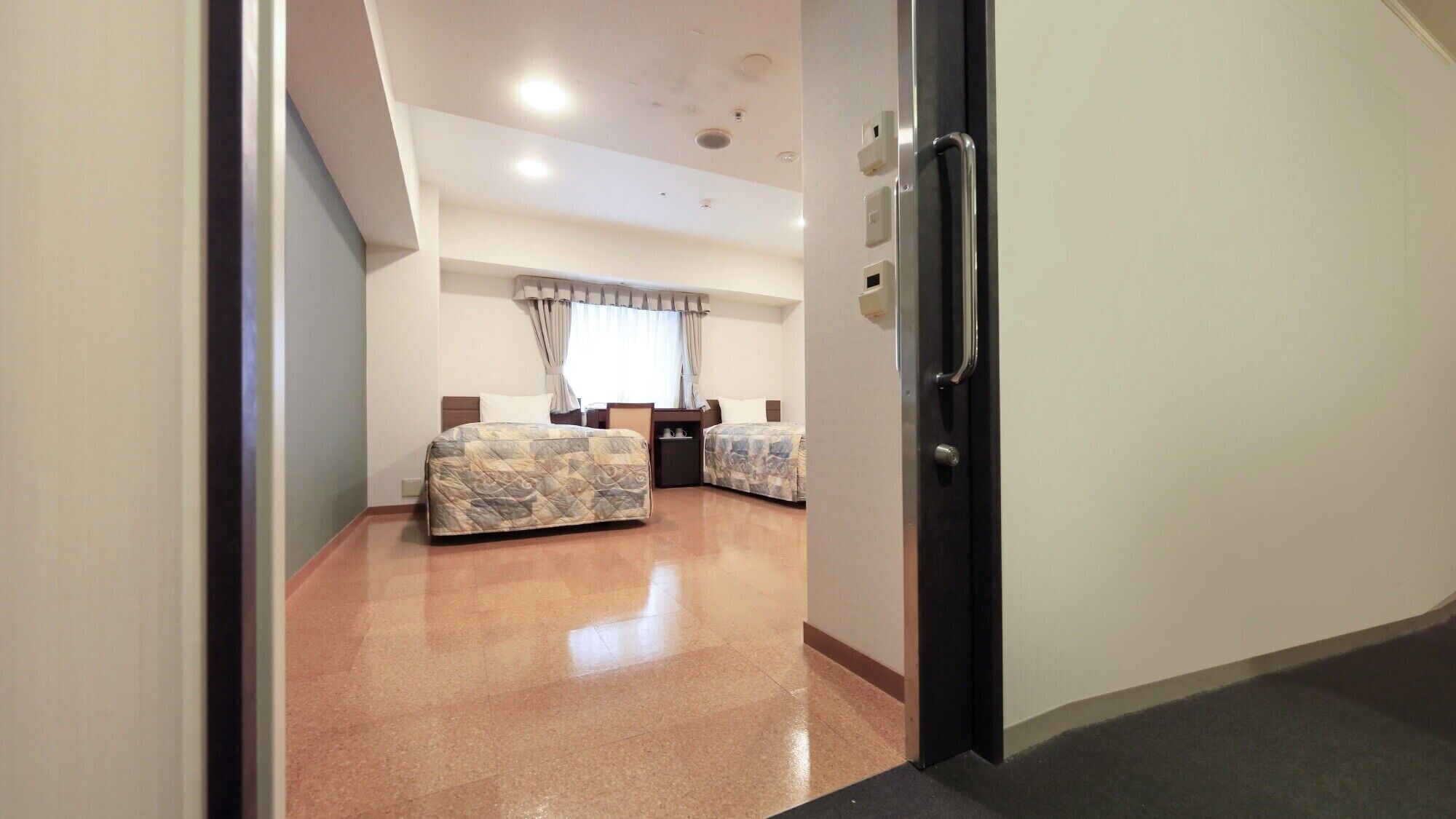 Premium bedding, desk, laptop workspace, free WiFi