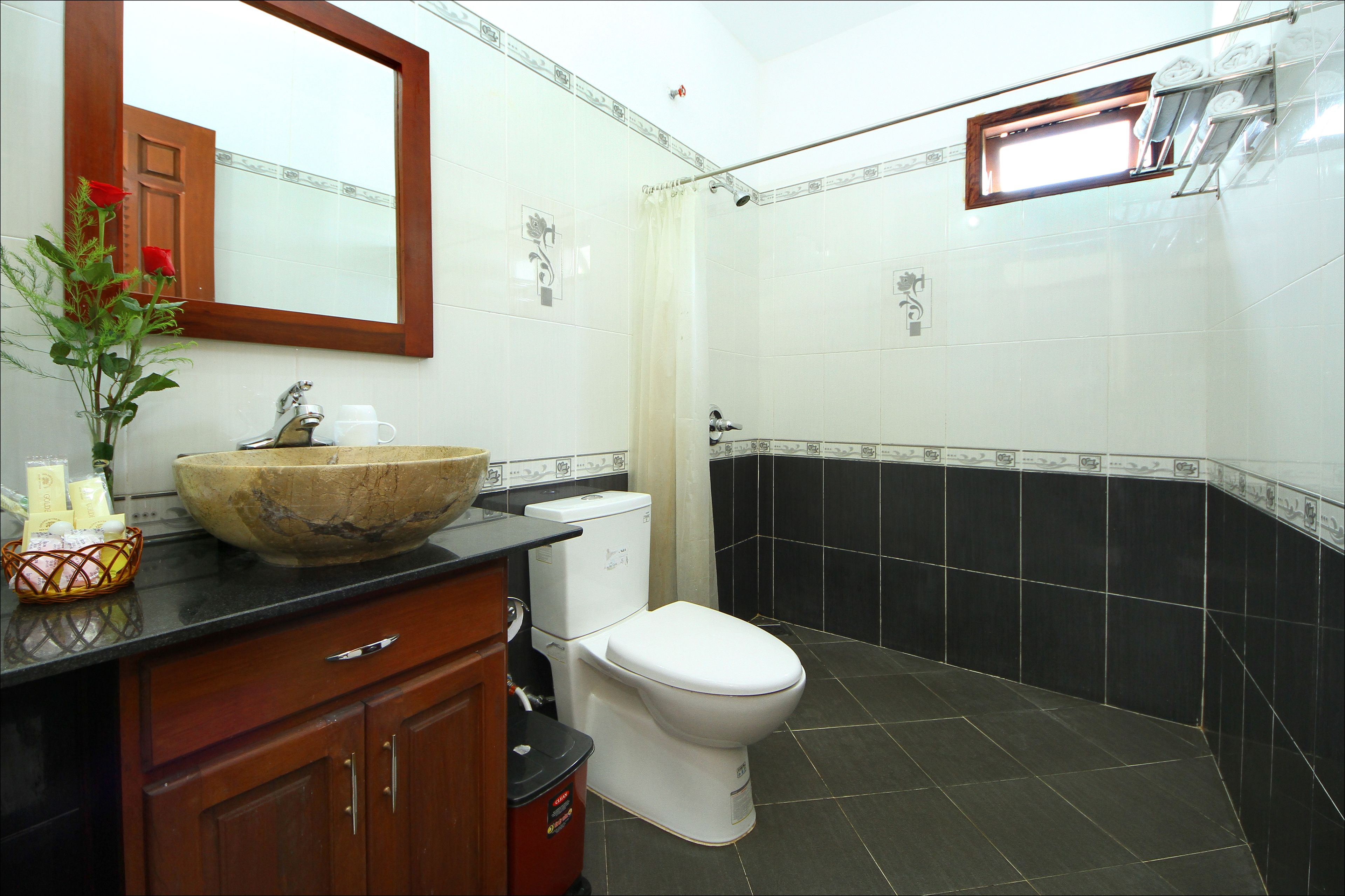 Shower, free toiletries, hair dryer, slippers