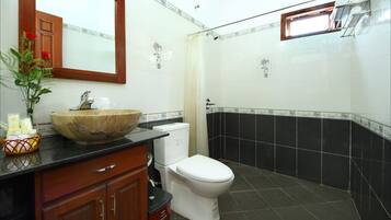 Shower, free toiletries, hair dryer, slippers