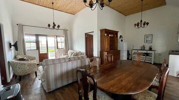 Standard Cottage, 3 Bedrooms, Vineyard View | Living area | Flat-screen TV, DVD player