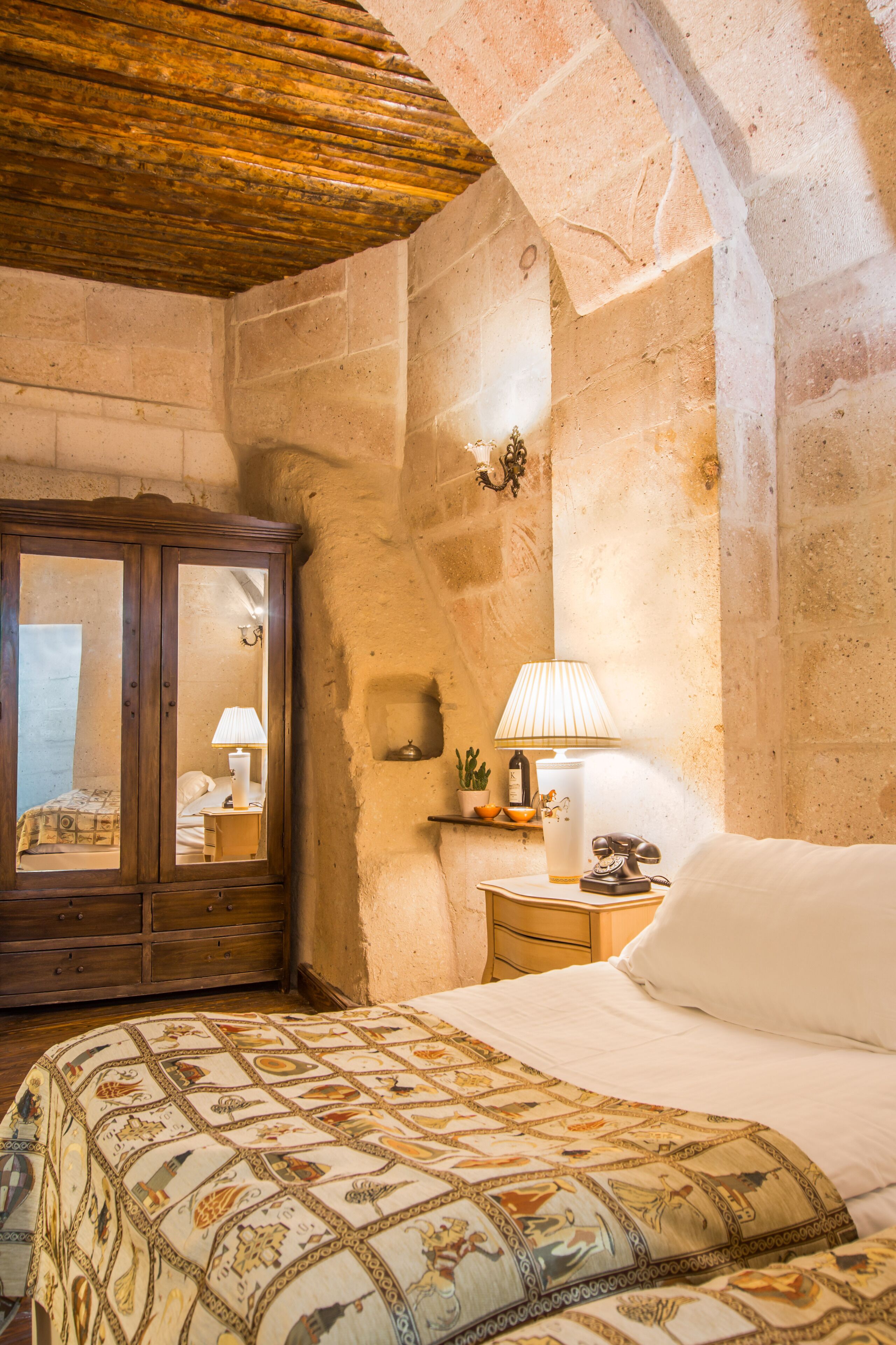 superior stone or cave room | 1 bedroom, minibar, in-room safe, individually decorated