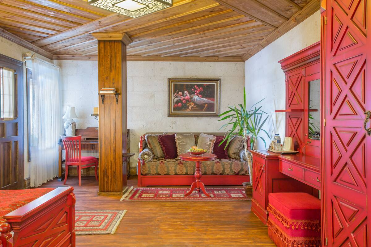 deluxe stone room | 1 bedroom, minibar, in-room safe, individually decorated