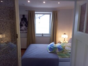 Quarto casal standard, banheiro privativo | Frigobar, escrivaninha, ferros/tábuas de passar roupa