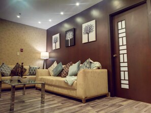 Presidential-Studiosuite | Wohnbereich | Flachbildfernseher