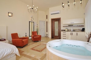 Premium suite | Geluiddichte muren, een strijkplank/strijkijzer, gratis wifi, beddengoed