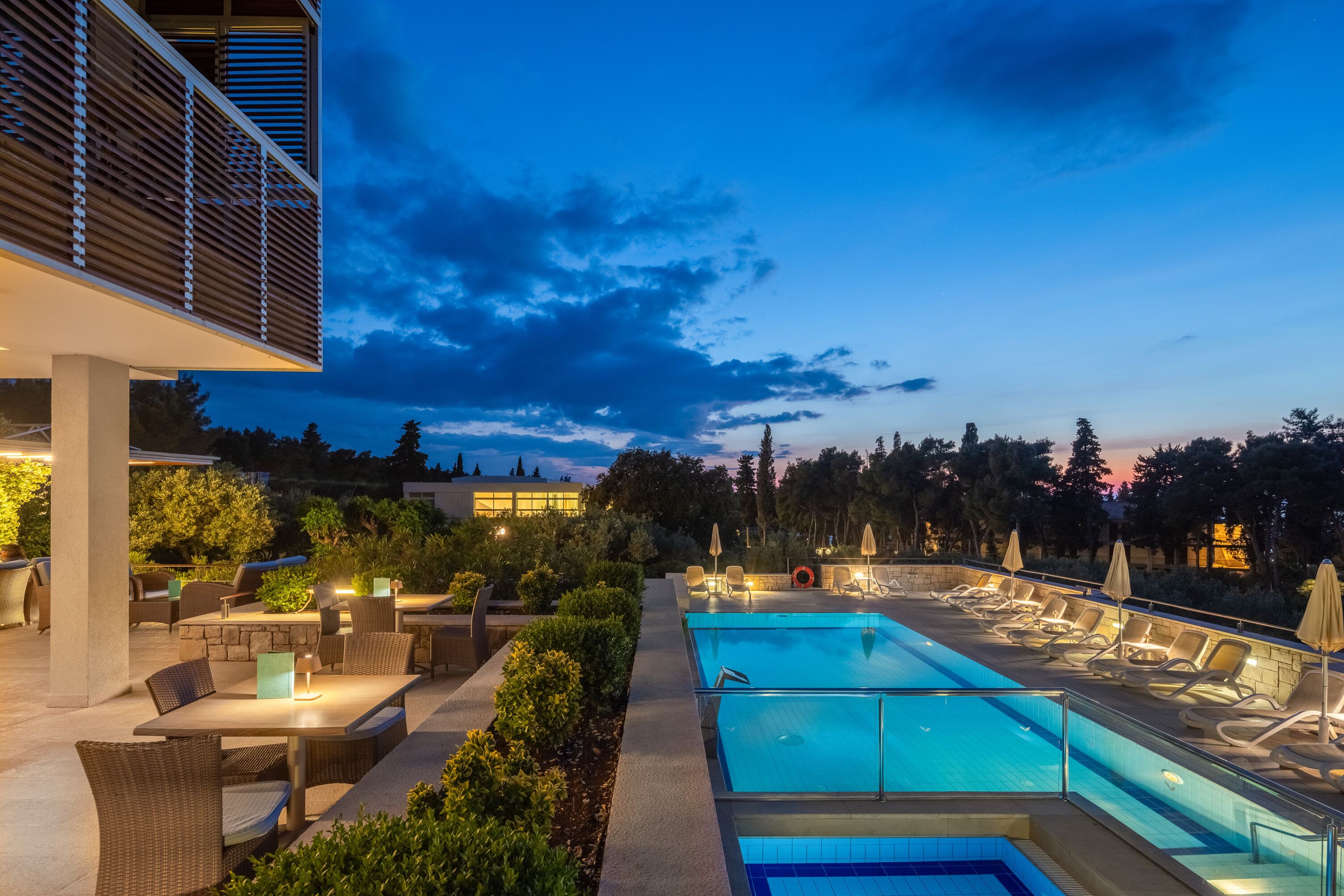 outdoor pool, pool umbrellas, pool loungers