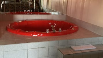 Deluxe Room, 1 King Bed, Smoking (Whirlpool Tub) | Jetted bathtub