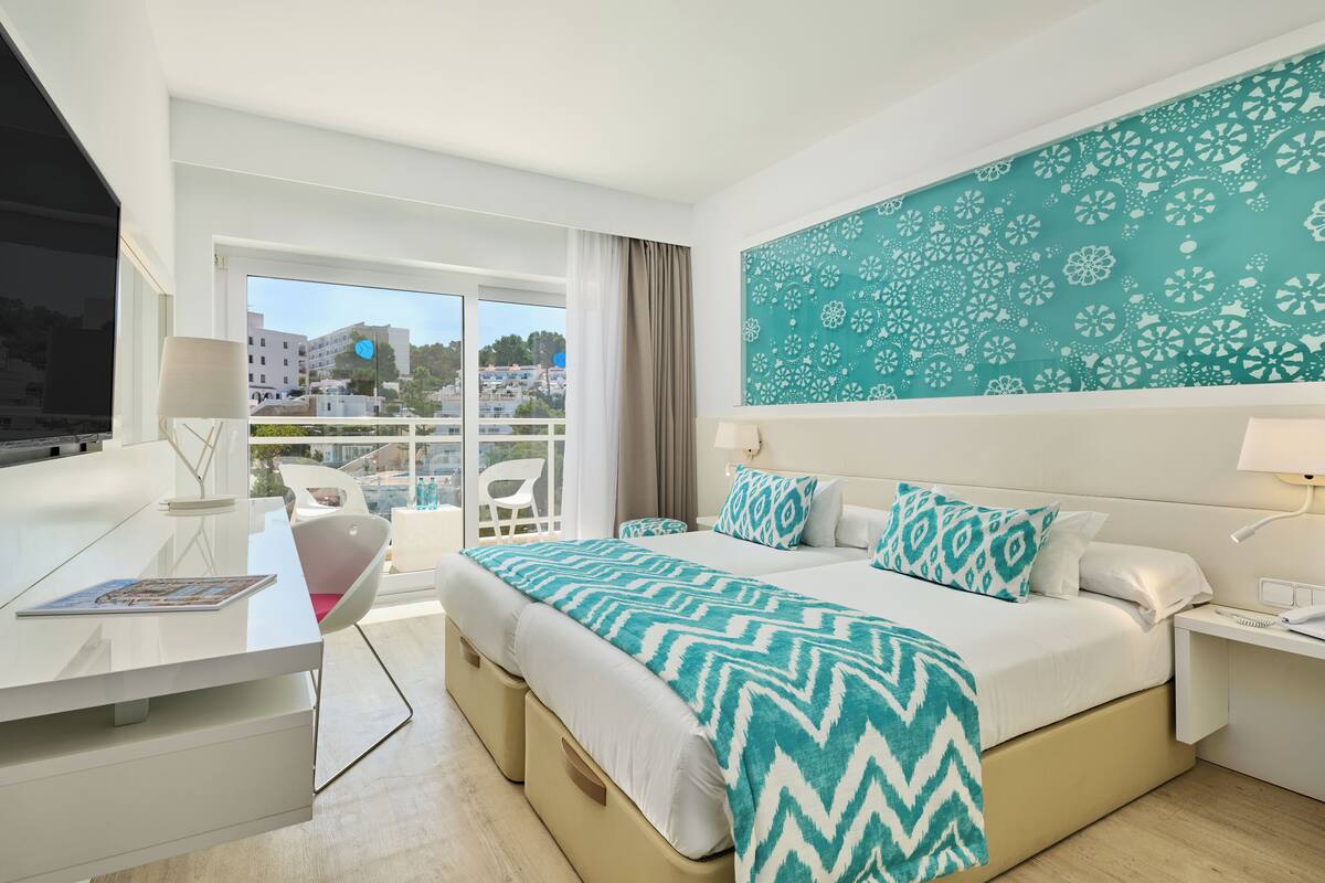 Double Room, Balcony, Partial Sea View | In-room safe, desk, free WiFi, bed sheets