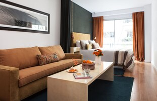 Premium bedding, in-room safe, individually decorated