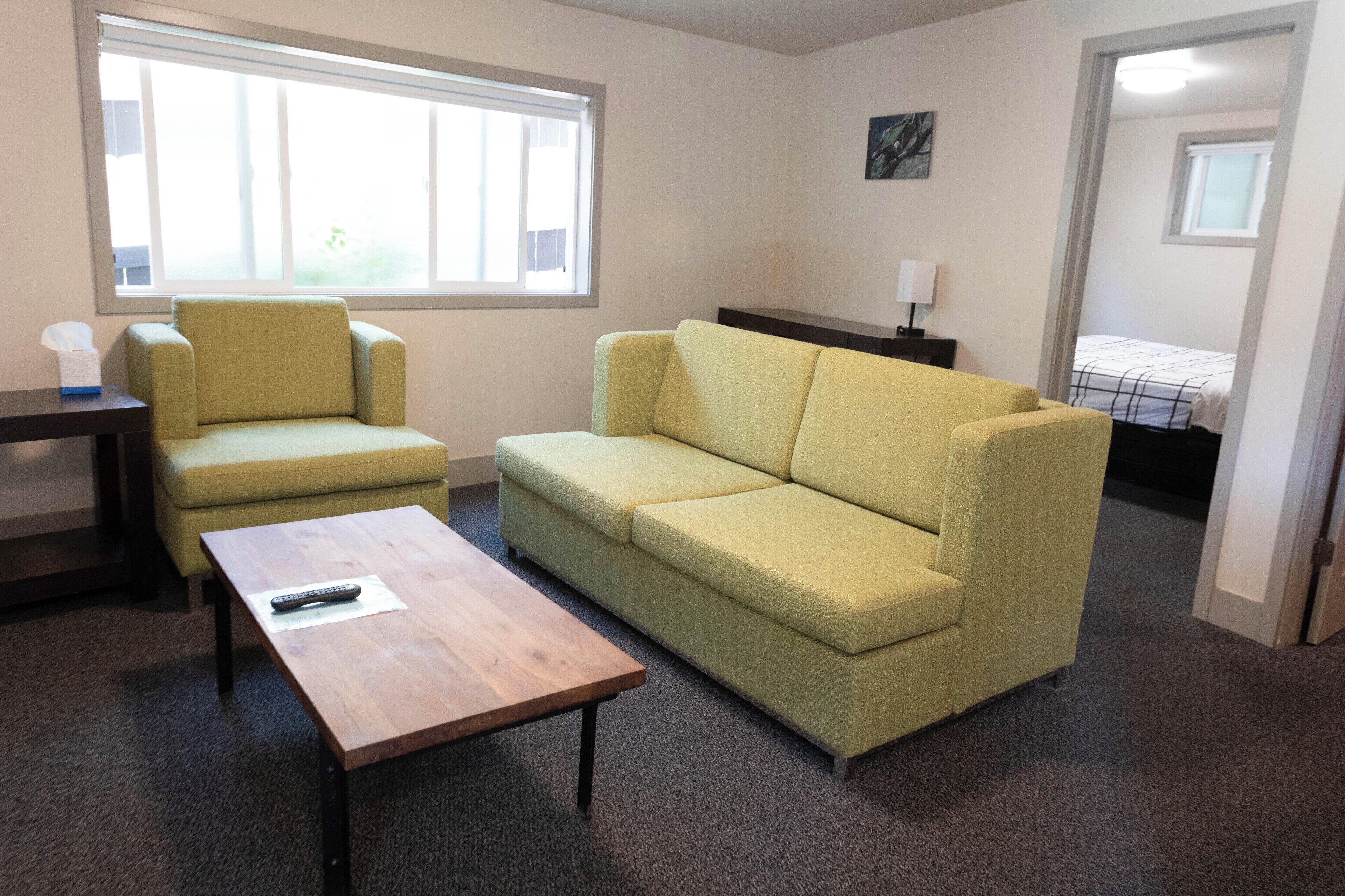 suite, 2 bedrooms, mountain view | living area | flat-screen tv