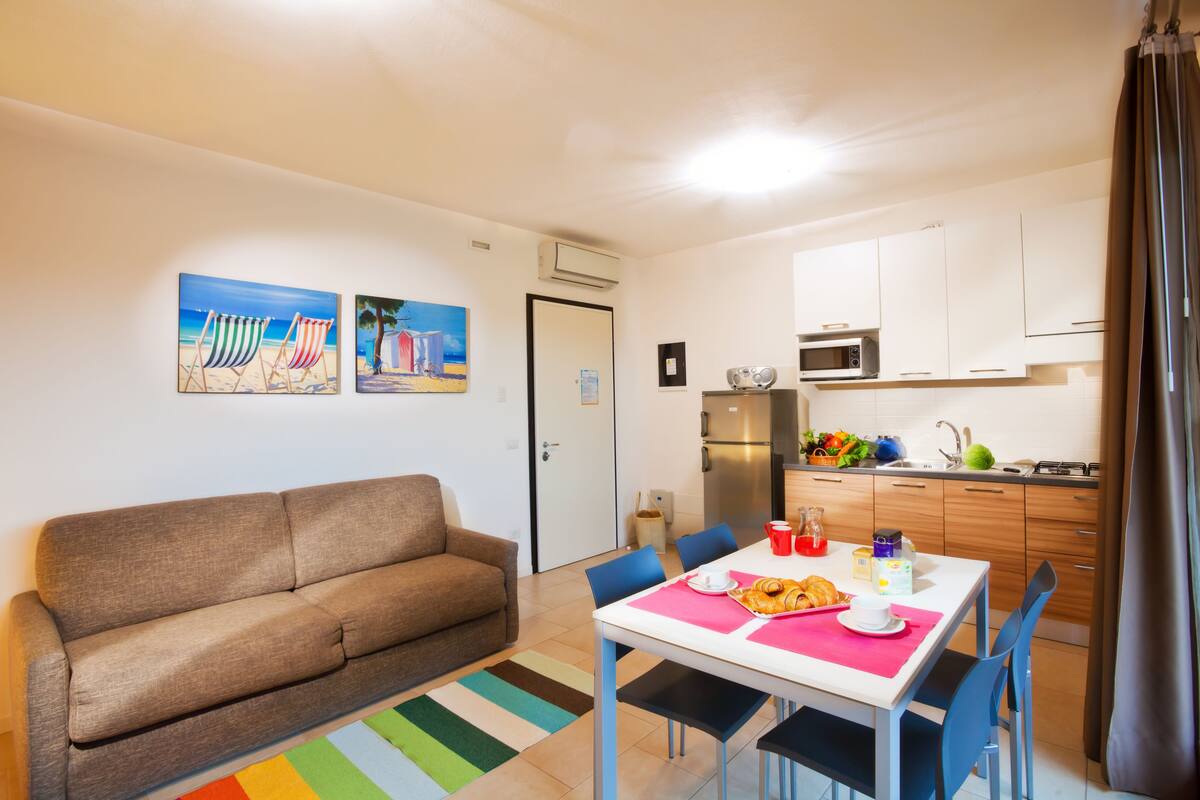 Apartment, 1 Bedroom (4 pax) | Living area | Flat-screen TV