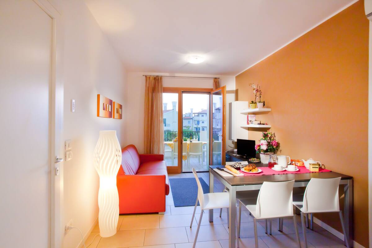 Apartment, 2 Bedrooms (6 pax) | Living area | Flat-screen TV