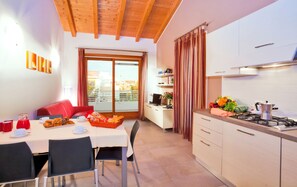 Apartment, 2 Bedrooms | Living area | Flat-screen TV - Villaggio Laguna Blu (Caorle)