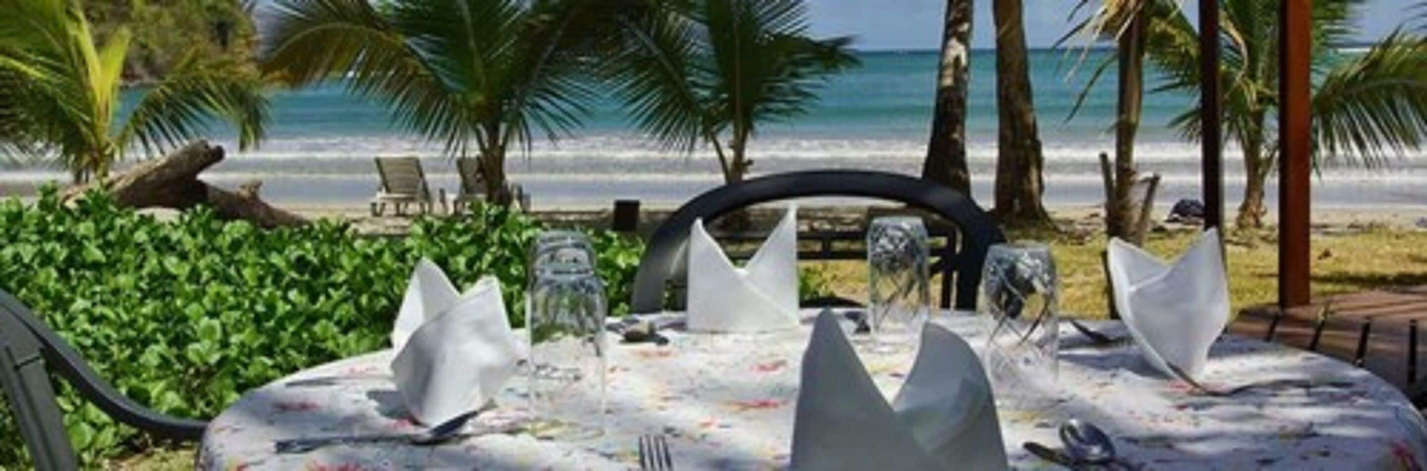 Breakfast, lunch, dinner served; local cuisine, beach views 